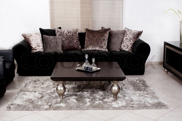 Wohnzimmer schwarzes sofa