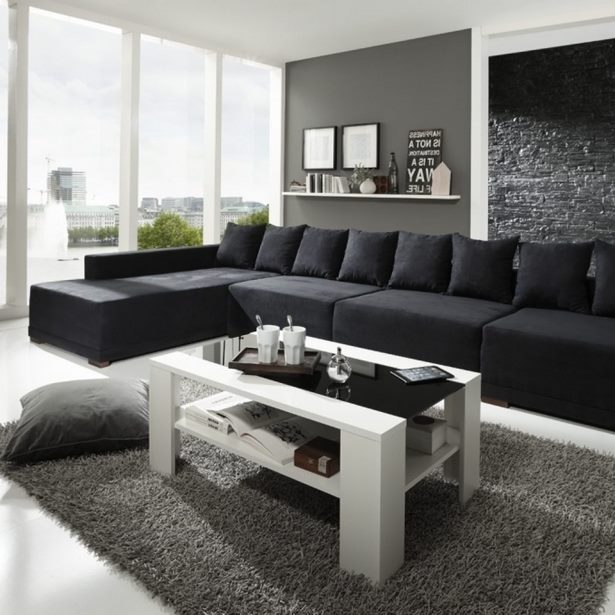 Wohnideen schwarzes sofa